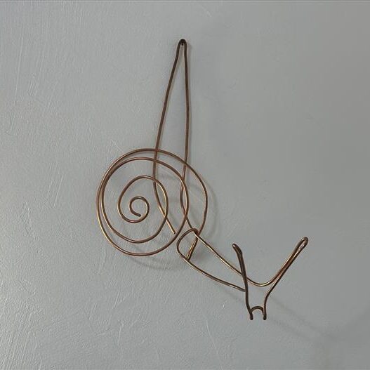 Copper snail sculpture